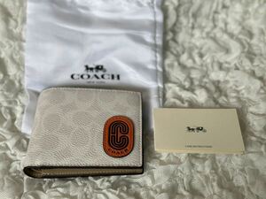 88 新品未使用 COACH コーチ 二つ折り財布 ミニ財布 ワッペン シグネチャー アウトレット C8297