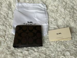 92 新品未使用 COACH コーチ 二つ折り財布 ミニ財布 シグネチャー アウトレット F75006