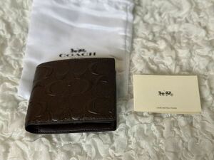 107 新品未使用 COACH コーチ 二つ折り財布 ミニ財布 シグネチャー アウトレット F75371