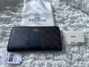 145 新品 COACH コーチ 長財布 シグネチャー ラウンドファスナー F54630