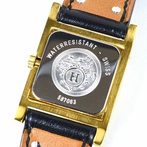 175233◆動作確認済 HERMES エルメス メドール 腕時計 クォーツ 2針 〇W刻印 GP レザー 革 ホワイト ゴールド ブラック レディース/ Dの画像9