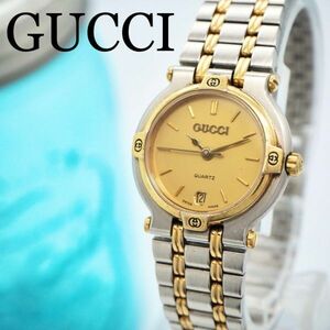 156[ beautiful goods ]GUCCI Gucci clock lady's wristwatch Gold Date combination 