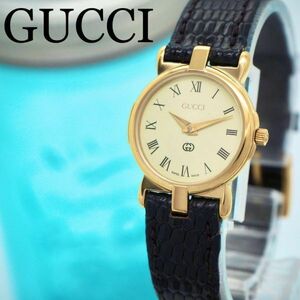256 GUCCI Gucci clock lady's wristwatch black Gold accessory attaching 