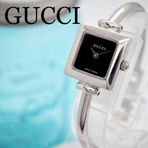 449[ beautiful goods ]GUCCI Gucci clock lady's wristwatch black bangle type 