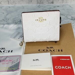  COACH 二つ折り 財布 エンボス加工