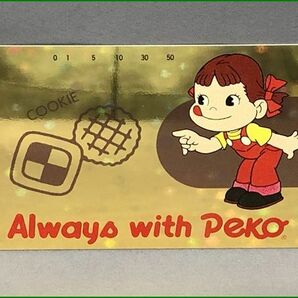  24【未使用】不二家 ペコちゃん Always with Peko テレカ 50度の画像1