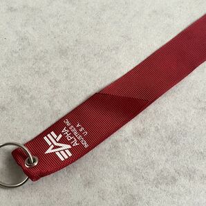 未使用 ALPHA INDUSTRIES 赤リボン REMOVE BEFORE FLIHT アルファ ミリタリー フライト ジャケット キーホルダー ストラップ MA-1の画像2