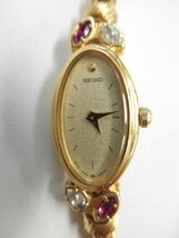SEIKO 1E20-5760 QZ オーバル ゴールドカラー ゴールド文字盤 セイコー レディース クォーツ ブレスレットウォッチ 腕時計 カラーストーン_画像1