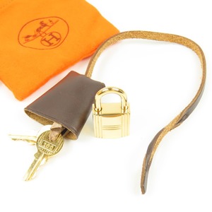 79864HERMES エルメス 新品同様美品 クロシェット カデナ キー 3点セット 100番 G金具 南京錠 鍵 バッグ用 レザー ブラウン