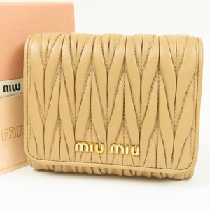 41275*1 jpy start *MIUMIU MiuMiu ultimate beautiful goods ma tera segya The - Logo three folding purse leather cameo 