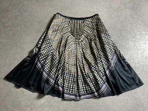 MOGA* spring * gorgeous . ten thousand . mirror. like *. what . geo me Trick * stretch. effect .. tuck flair skirt * size 2* made in Japan * Moga 