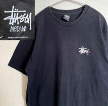 メキシコ製STUSSY ステューシー 背面デザイン 半袖Tシャツ 黒色 Mサイズ_画像1