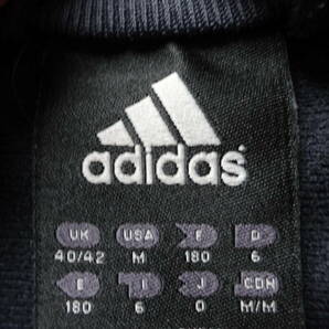 adidas/アディダス/長袖トラックジャケット/ジャージ素材/前ジップアップ/オレンジライン/スポーツ/黒/ブラック/Oサイズ(4/18R)の画像3