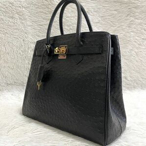 美品Les sacs adam ルサックアダム ゴールド金具 ベルトデザイン ハンドバッグ トートバッグレザー オーストリッチ ブラック 黒 本革 1円の画像1