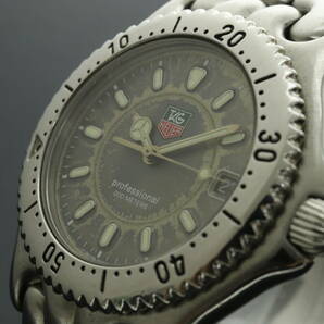 LVSP6-4-62 7T044-32 TAG HEUER タグホイヤー 腕時計 WG1113-0 セル プロフェッショナル デイト クォーツ 約102g メンズ シルバー ジャンクの画像1