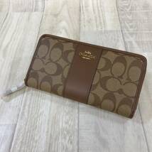 NZ986●COACH ラウンドジップ ロング ウォレット●ブラウン コーチ シグネチャー 長財布_画像1