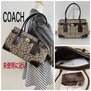 【期間限定価格！未使用に近い】COACH コーチ トートバッグ 肩掛け ターンロック シグネチャー A4収納可能 チャーム付き