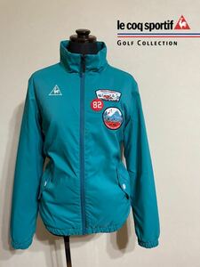 【美品】 le coq sportif golf ルコック ゴルフ ウェア レディース 中わた ジャケット ワッペン トップス サイズM 長袖 エメグリ XQGL6018