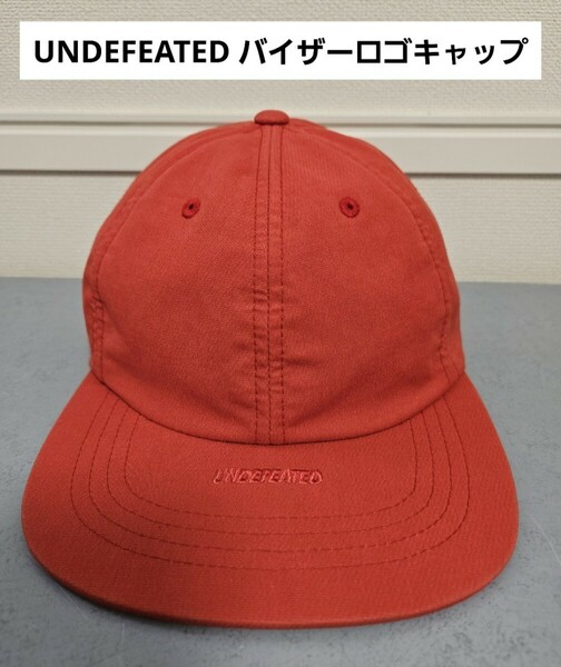 undefeated バイザーロゴキャップ レッド系 メンズ アンディフィーテッド 帽子