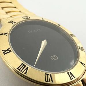 15816/ GUCCI 3300M グッチ ゴールド 金 ブラック文字盤 腕時計の画像1