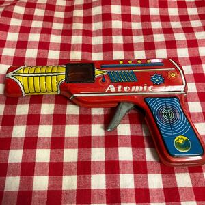 中古ブリキ GUN Atomic赤色火花あり。