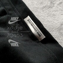 新品 正規品 NIKE STANDARD ISSUE ナイキ スウェットパンツ ジョガーパンツ テーパード 両足 ロゴ プリント 黒 ブラック 2XL XXL_画像4