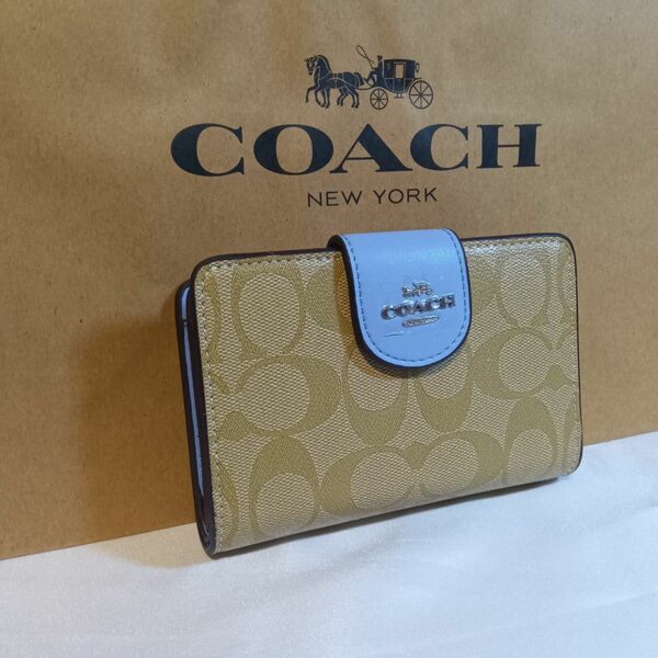 coach コーチ 2つ折り財布　ブルーボタンタイプ