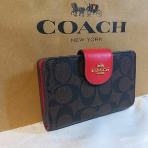 coach コーチ 2つ折り財布 赤ボタン