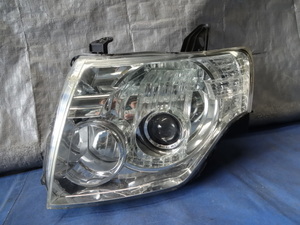  Pajero (V93W) передняя фара левый /HID/100-87874/ металлизированный / оригинальный 