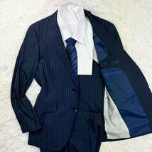 極美品/パーフェクトスーツファクトリー perfect suit factory セットアップ ストライプ 紺色 ネイビー ストライプ ウール 高級感◎ A5 M位_画像1