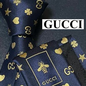 激レア GUCCI グッチ 美品 ネクタイ 現行 シルクGG柄 ジャガード 刺繍 蜂 bee ハート 星 四葉 クローバー ナロータイ ネイビー 紺の画像1