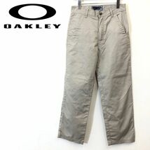 M2528-F-N◆ OAKLEY オークリー スカル チノパンツ ボトムス ◆ size30 コットン ポリエステル ベージュ 単色 古着 メンズ_画像1