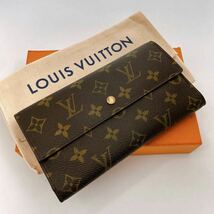 H785【美品】LOUIS VUITTON ルイヴィトン ポルトフォイユ　インターナショナル M61734 モノグラム　二つ折り長財布 カード入れ×_画像1