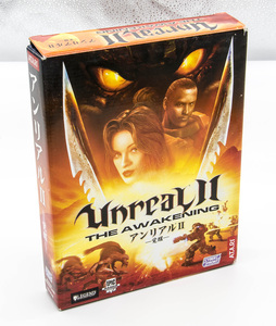 Unreal II пробуждение Unreal II, пробуждая японское ручное ручное управление CD-ROM, используется