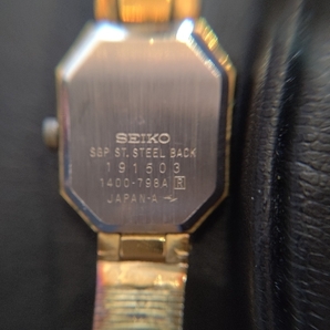 *3426 SEIKO セイコー 1400-798A QUARTZ クォーツ ゴールドカラー ブラック文字盤 レディース腕時計 不動 箱なし 長期保管品の画像2