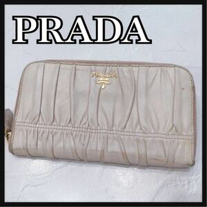 ☆PRADA☆ プラダ 長財布 財布 ロングウォレット ウォレット ピーチベージュ レザー 本革 ギャザー ラウンドジップ レディース 送料無料