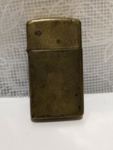 アンティーク Zippo ソリッドブラス SOLID BRASS 真鍮 1932-1983　ダブルイヤー　金色　ゴールドスリム　動作未確認　_画像1