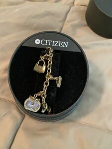 Citizen Ladies MOP Purse Charm Watch Eco-Drive with Swarovski Light Powered 海外 即決