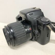 1円〜【Canon】3-33 EOS1000 D QD レンズ　三脚　フィルムカメラ （ジャンク品）_画像4