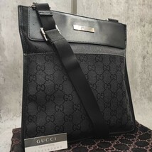 極美品/付属品付き●GUCCI グッチ メンズ ショルダーバッグ サコッシュ ポシェット 斜め掛け GGキャンバス ロゴプレート レザー 黒ブラック_画像1