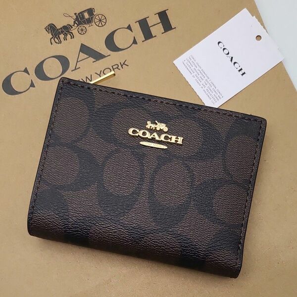 新作　COACH　折り財布　シグネチャー　レディース