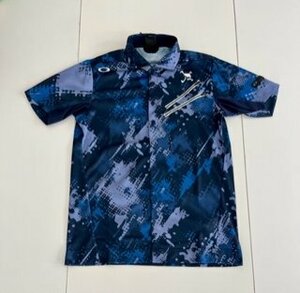 オークリー　ＳＫＵＬＬ　ＮＯＩＳＹ　ＴＯＮＥ　ＳＨＩＲＴ　ＦＯＡ４０５１３３　(ＢＬＵＥ ＳＴＯＲＭ ＰＲＩＮＴ)　ＸＬ