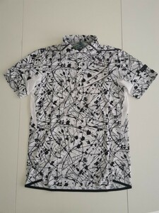 オークリー　ＳＫＵＬＬ　ＡＵＲＯＲＡ　ＣＡＬＬＩＧＲＡＰＨＩＣ　ＳＨＩＲＴＳ　ＦＯＡ４０2４８１　(ＷＨＩＴＥ ＰＲＩＮＴ)　Ｌ