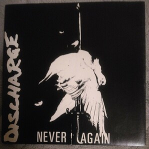 DISCHARGE/NEVER AGAIN 7インチ CLAY RECORDS UK盤の画像1
