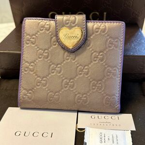 新品同様！ グッチ GUCCI 財布 二つ折り　折り財布　シマレザー　ハート金具