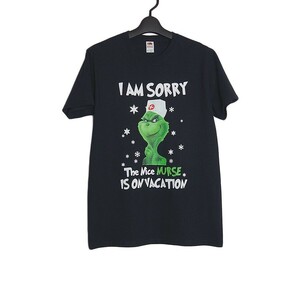 新品 グリンチ プリント Tシャツ ティーシャツ ナース FRUIT OF THE LOOM 黒 半袖 メンズ Sサイズ トップス キャラクター