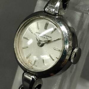 060417 261531 INTERNATIONALWATCH インターナショナルウオッチ 伸縮ベルト シルバーカラー 手巻き 腕時計 不動品 USED品