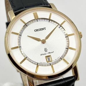 ORIENT 腕時計 デイト サファイアクリスタル ラウンド バーインデックス 2針 クォーツ quartz ゴールド 金 オリエント Y691の画像5