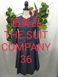 THE SUIT COMPANY