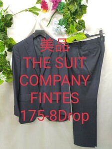 THE SUIT COMPANY